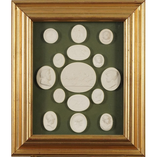 267 - Fifteen Grand Tour plaster cameos arranged in a framed, glazed display including one entitled Valeri... 