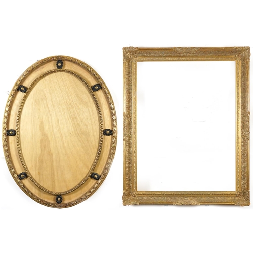 148A - Two ornate gilt picture frames including an oval example, the largest 100cm x 80cm