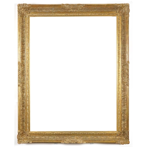 148A - Two ornate gilt picture frames including an oval example, the largest 100cm x 80cm