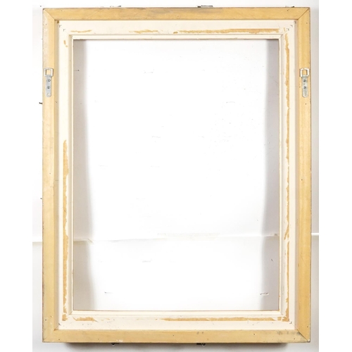 148A - Two ornate gilt picture frames including an oval example, the largest 100cm x 80cm