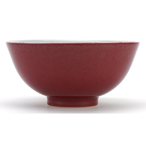 602 - Chinese porcelain bowl having a sang de boeuf glaze, six figure character marks to the base, 14cm in... 