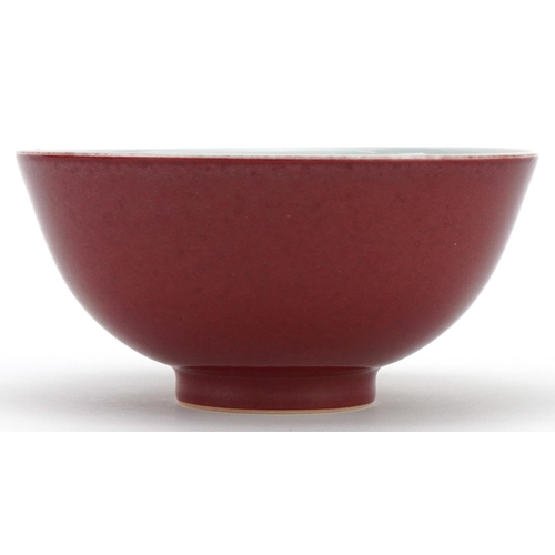 602 - Chinese porcelain bowl having a sang de boeuf glaze, six figure character marks to the base, 14cm in... 