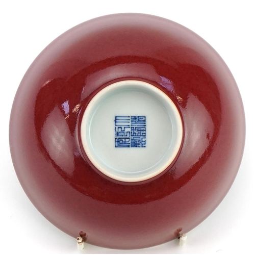 602 - Chinese porcelain bowl having a sang de boeuf glaze, six figure character marks to the base, 14cm in... 