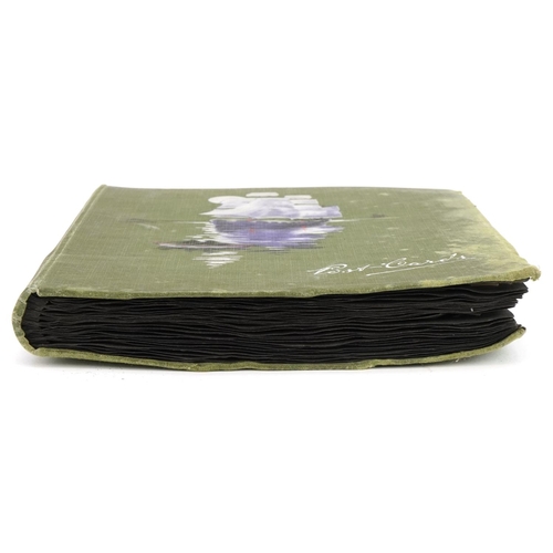 777 - Topographical and social history postcards arranged in an album including street scenes and portrait... 