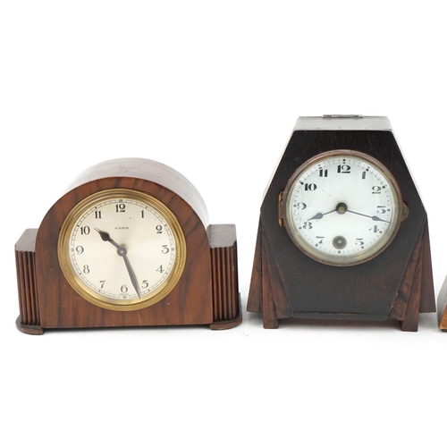 Four Art Deco walnut and oak mantle clocks including Temco, Davall and ...