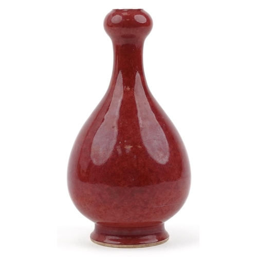 600 - Chinese porcelain garlic head vase having a sang de boeuf glaze, six figure character marks to the b... 