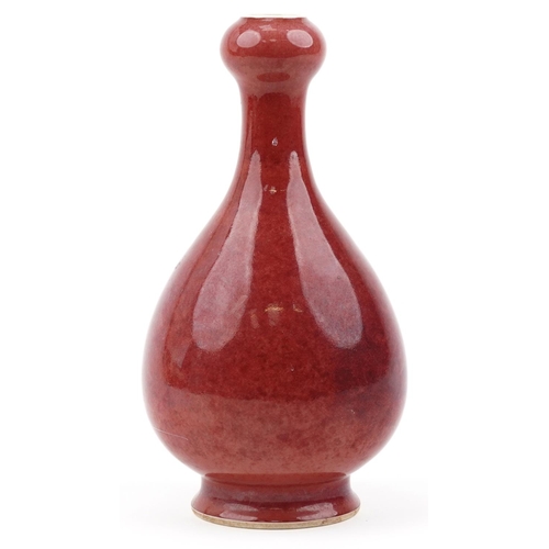 600 - Chinese porcelain garlic head vase having a sang de boeuf glaze, six figure character marks to the b... 