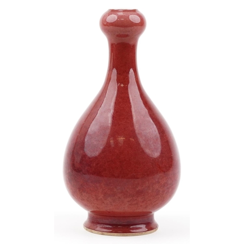 600 - Chinese porcelain garlic head vase having a sang de boeuf glaze, six figure character marks to the b... 