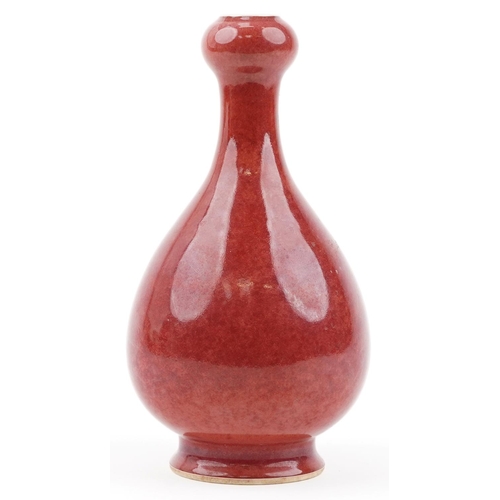 600 - Chinese porcelain garlic head vase having a sang de boeuf glaze, six figure character marks to the b... 