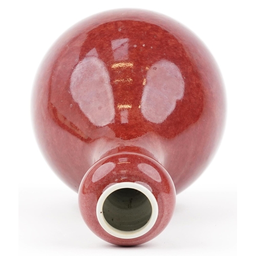 600 - Chinese porcelain garlic head vase having a sang de boeuf glaze, six figure character marks to the b... 