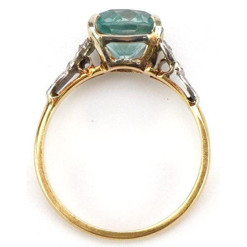 3225 - 18ct gold blue topaz solitaire ring with diamond set shoulders, the topaz approximately 8.0mm in dia... 