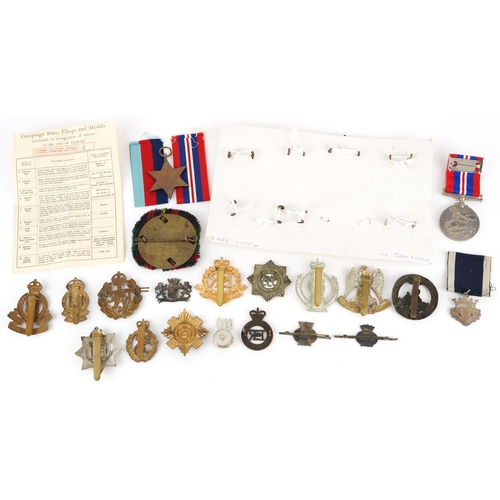 1259 - British military World War II medals, cap badges and sweetheart brooches including box of issue insc... 