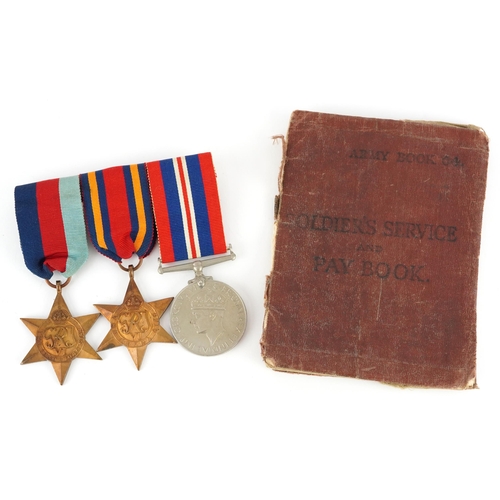 1234 - British military World War II three medal group with Soldier's Service and Pay book inscribed Edward... 