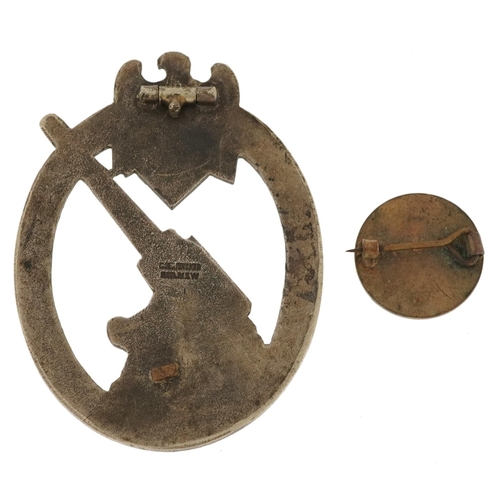 1248 - German military interest assault badge and a swastika brooch