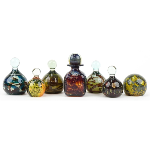 417 - Mdina, Maltese art glass comprising six paperweights and a scent bottle with stopper, the largest 15... 