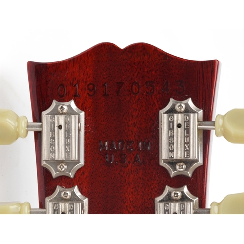 617 - Gibson Classic Les Paul electric guitar with mother of pearl inlay housed in a Gibson protective cas... 