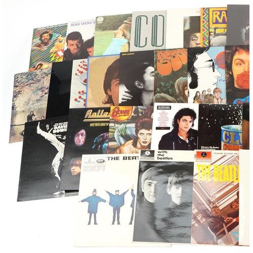 921 - Vinyl LP records including The Rolling Stones, Paul McCartney, The Beatles, Stevie Wonder and Rod St... 