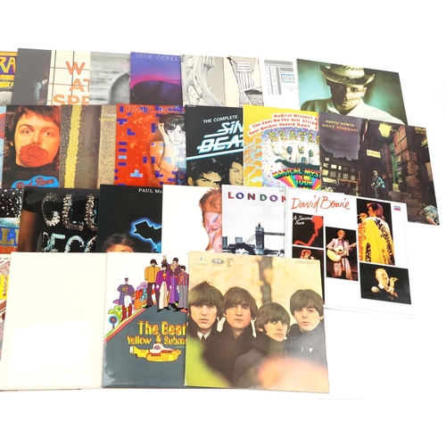 921 - Vinyl LP records including The Rolling Stones, Paul McCartney, The Beatles, Stevie Wonder and Rod St... 