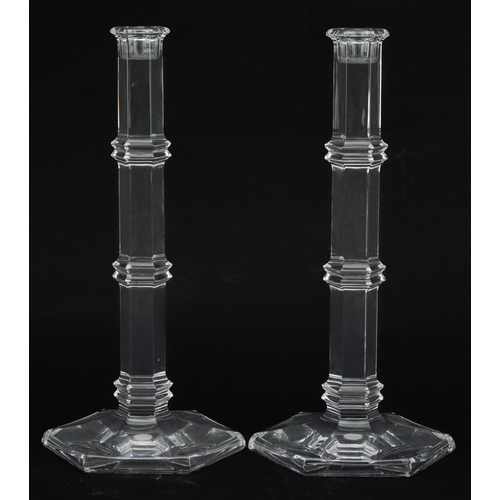 414 - Pair of Tiffany & Co glass candlesticks, etched marks and paper labels to the bases, each 28.5cm hig... 