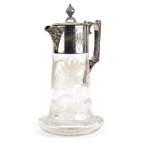 82 - Hukin & Heath, Victorian aesthetic glass claret jug engraved and etched with leaves having silver pl... 