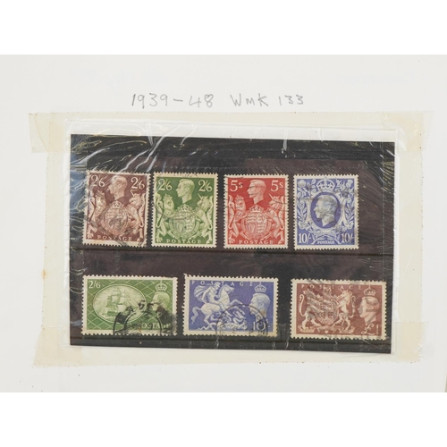 813 - British and world stamps arranged in two albums including Mauritius, some reproduction