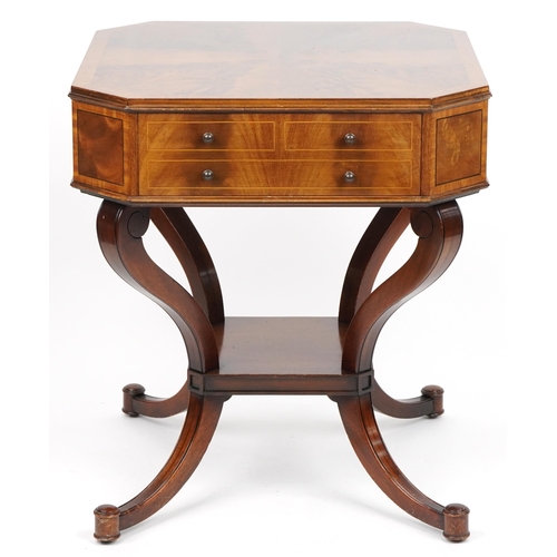 1008 - Inlaid mahogany centre table with flame veneered top canted corners, frieze drawers on S scroll legs... 