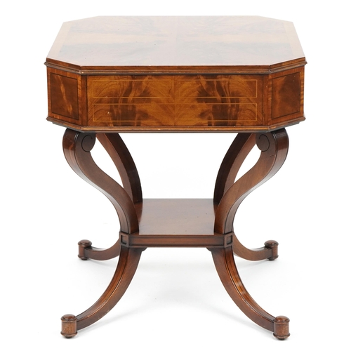 1008 - Inlaid mahogany centre table with flame veneered top canted corners, frieze drawers on S scroll legs... 