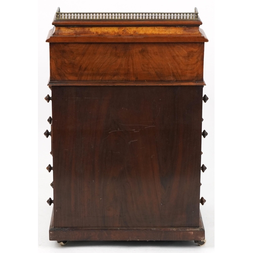 1002 - Victorian burr walnut Davenport with lift up top, tooled leather insert and four side drawers, 88cm ... 