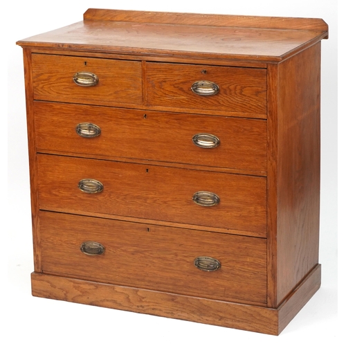 1017 - Edwardian oak five drawer chest with bronzed handles, 110cm H x 107cm x 55cm D