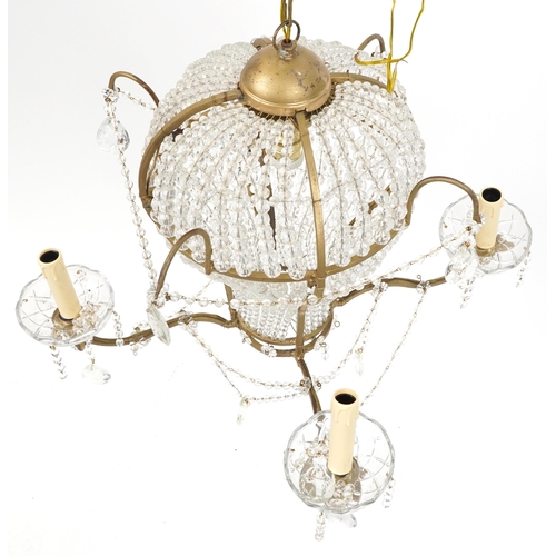 1033 - Ornate gilt metal and glass four branch chandelier with four girondelles and drops, overall 88cm hig... 