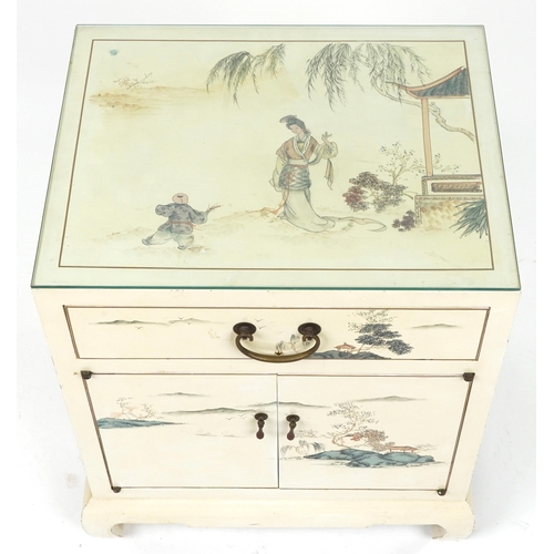 1034 - Cream lacquer nightstand with drawer above cupboard doors hand painted in the chinoiserie manner wit... 