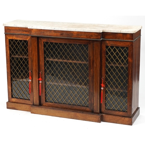 1009 - Victorian rosewood three section breakfront bookcase with marble top and brass inlay, each section e... 