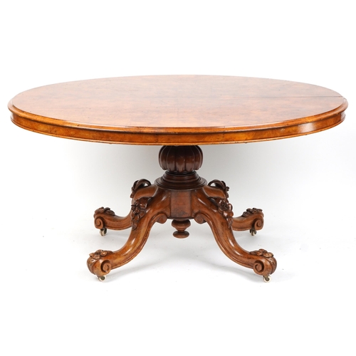 1007 - Victorian burr walnut loo table with quarter veneered top and floral carved knees and feet, 74cm H x... 