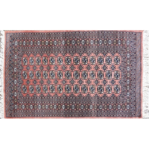 1020 - Rectangular Persian rug having an allover repeat design, 190cm x 125cm