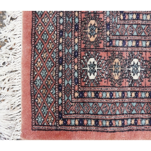 1020 - Rectangular Persian rug having an allover repeat design, 190cm x 125cm