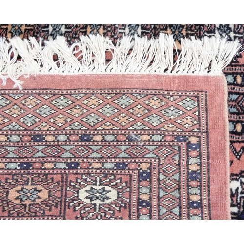 1020 - Rectangular Persian rug having an allover repeat design, 190cm x 125cm