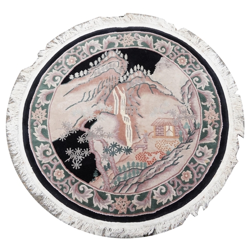 1035 - Circular Chinese rug decorated with a figure beside water, 160cm in diameter