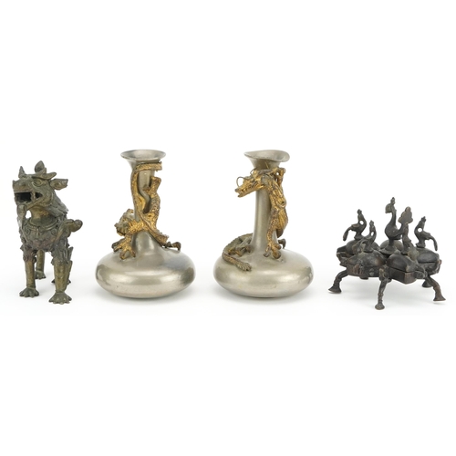 207 - Indian and Asian metalware including a pair of pewter vases surmounted with dragons, the largest eac... 