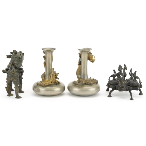 207 - Indian and Asian metalware including a pair of pewter vases surmounted with dragons, the largest eac... 