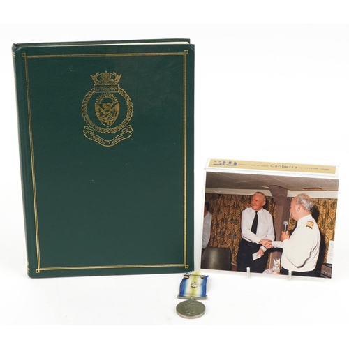 1239 - British military Elizabeth II South Atlantic medal with related book and photograph, the medal award... 