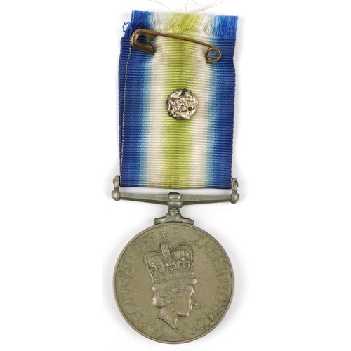 1239 - British military Elizabeth II South Atlantic medal with related book and photograph, the medal award... 