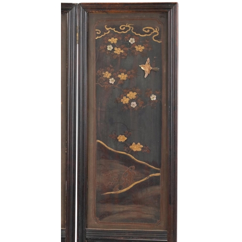 133 - Japanese hardwood and lacquered three fold screen with bone inlay, decorated in relief with two figu... 