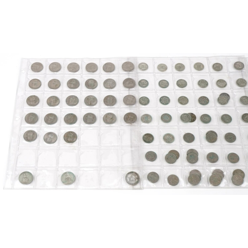 769 - British coinage arranged on four sheets, some pre 1947 including shillings and sixpences