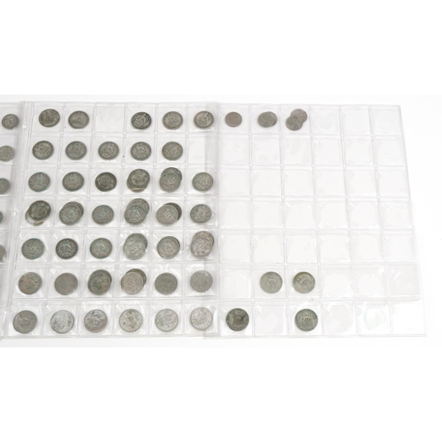 769 - British coinage arranged on four sheets, some pre 1947 including shillings and sixpences