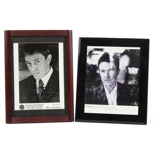 812 - Two ink autographs housed in framed displays comprising Bill Nelson and David Sylvian, the largest o... 