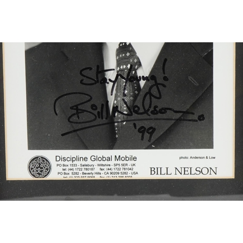 812 - Two ink autographs housed in framed displays comprising Bill Nelson and David Sylvian, the largest o... 