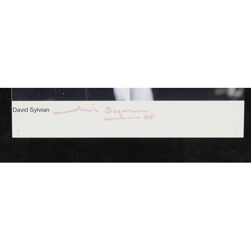 812 - Two ink autographs housed in framed displays comprising Bill Nelson and David Sylvian, the largest o... 