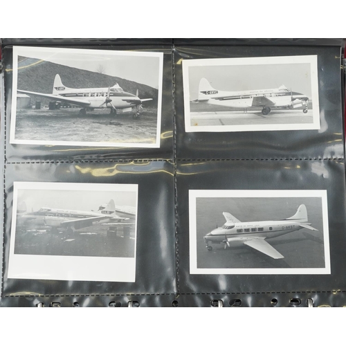 844 - Large collection of aviation interest black and white photographs arranged in two albums