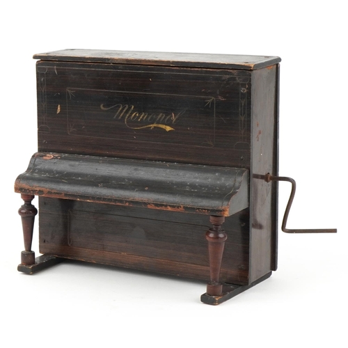 605 - Novelty Monopol polyphone in the form of a piano, 21cm high