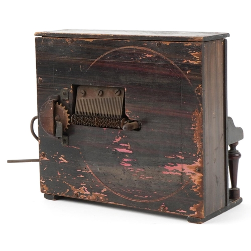 605 - Novelty Monopol polyphone in the form of a piano, 21cm high